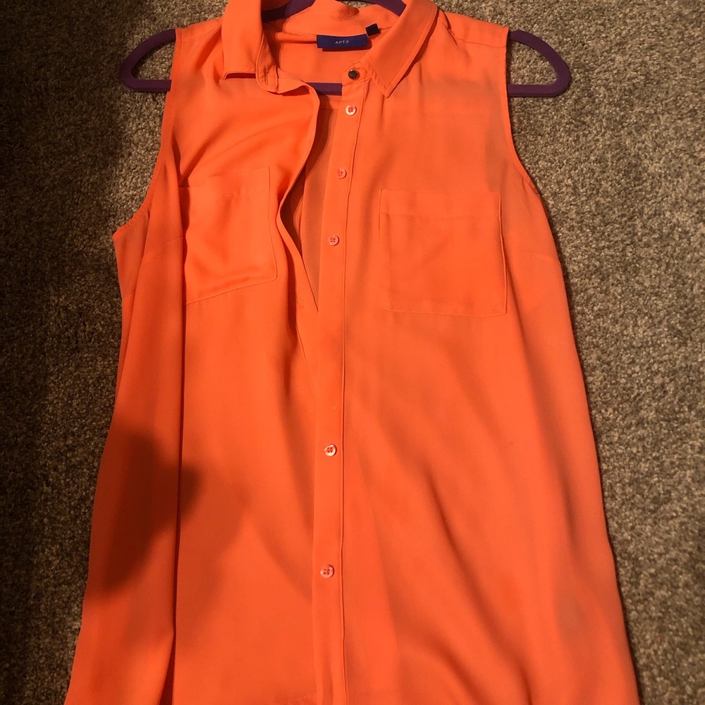 Sleeveless button-up blouse